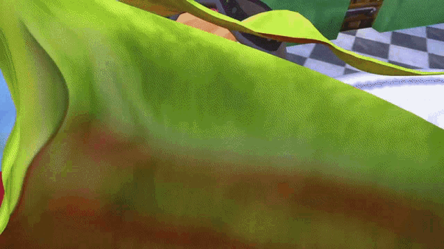 a close up of a green and brown colored fabric