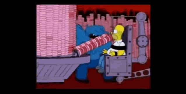 homer simpson is sitting in a chair in front of a machine holding a large piece of meat .
