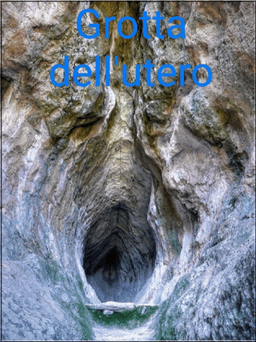 a picture of a cave with the words grotta dell ' utero in blue