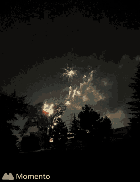 a fireworks display is displayed on a momento app