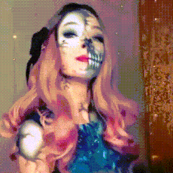 a woman with half of her face painted with a skull