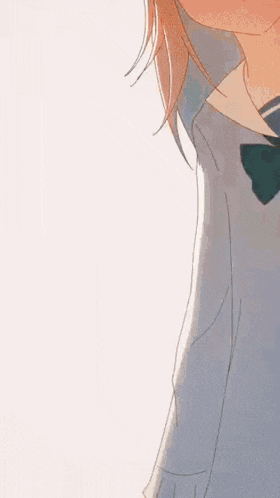 a close up of a girl with a bow tie