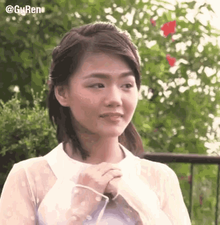 a close up of a woman 's face with the hashtag @guren on the bottom