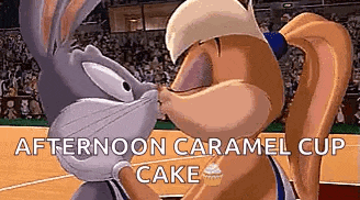 bugs bunny and lola bunny are kissing on a basketball court while playing a game of basketball .