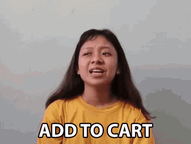 a woman in a yellow shirt is making a funny face and saying `` add to cart '' .