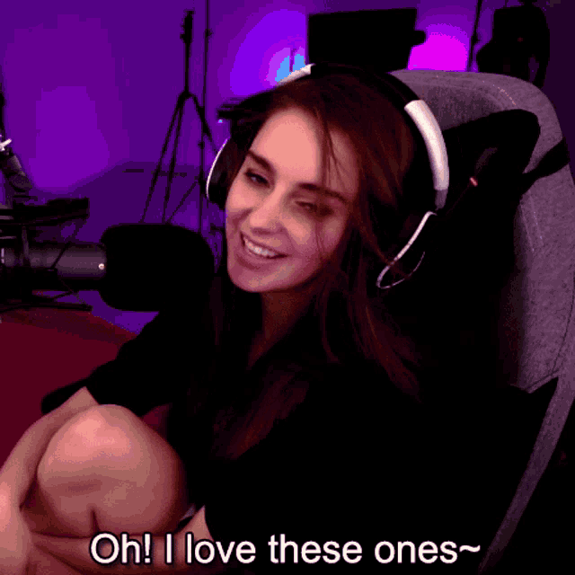 a woman wearing headphones with the words oh i love these ones written below her