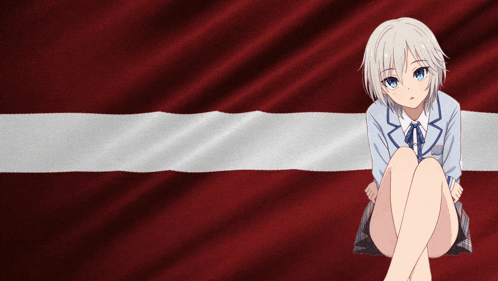 a girl is sitting in front of a red white and blue flag