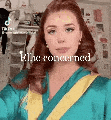 a woman in a graduation cap and gown is looking at the camera with the words `` ellie concerned '' written above her .