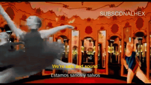 a video of people dancing with the words " we 're safe and sound " on the bottom