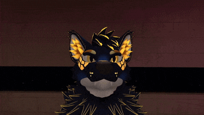 a close up of a furry animal 's face with yellow eyes