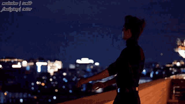 a blurry picture of a person standing on a ledge with the words madebysnoop tumblr written on the bottom right