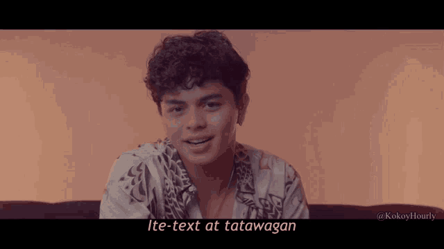 a young man sitting on a couch with the words ite-text at tatawagan on the bottom