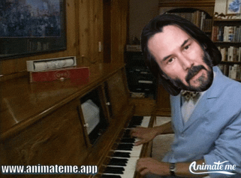 Keanu Reeves Playing Piano GIF