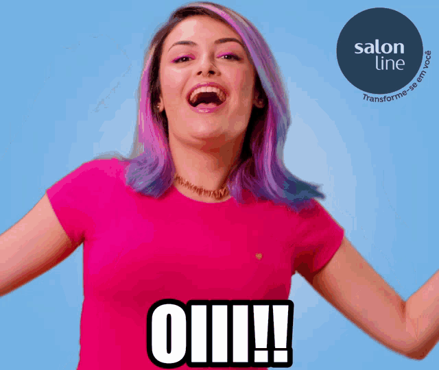 a woman with purple hair is wearing a pink shirt with the word oll on it