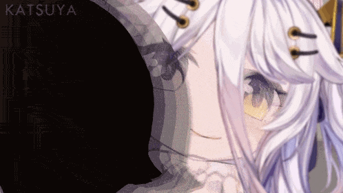a close up of a person 's face with the name katsuya on the bottom right