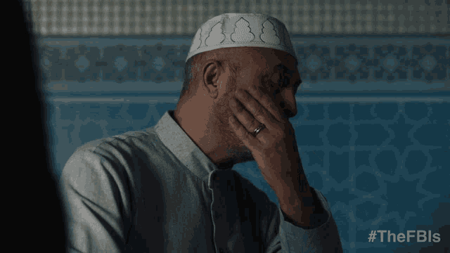 a man wearing a white hat has the hashtag #thefbls at the bottom of the image