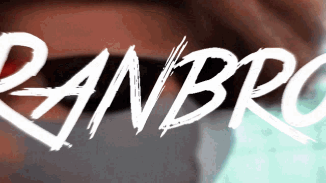 a close up of a person 's face with the word ranbro written in white