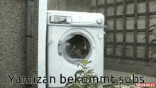 a picture of a washing machine with the words yamizan bekommt subs below it