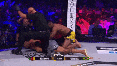 a boxing match between ngannou and ferreira takes place