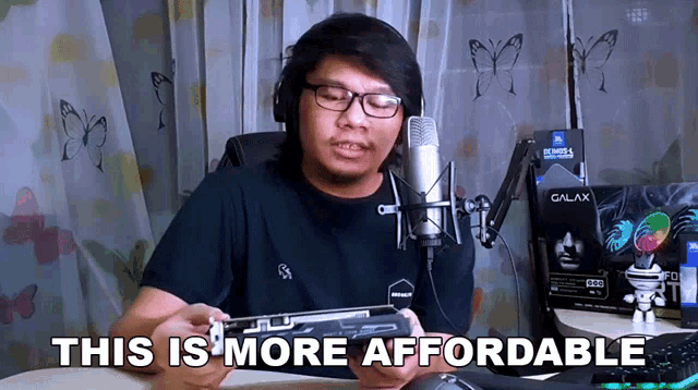 a man sitting in front of a microphone with the words " this is more affordable " below him