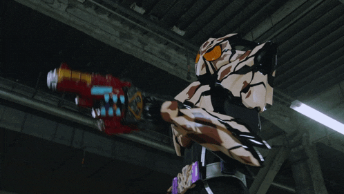 a cartoon character is holding a red and blue gun