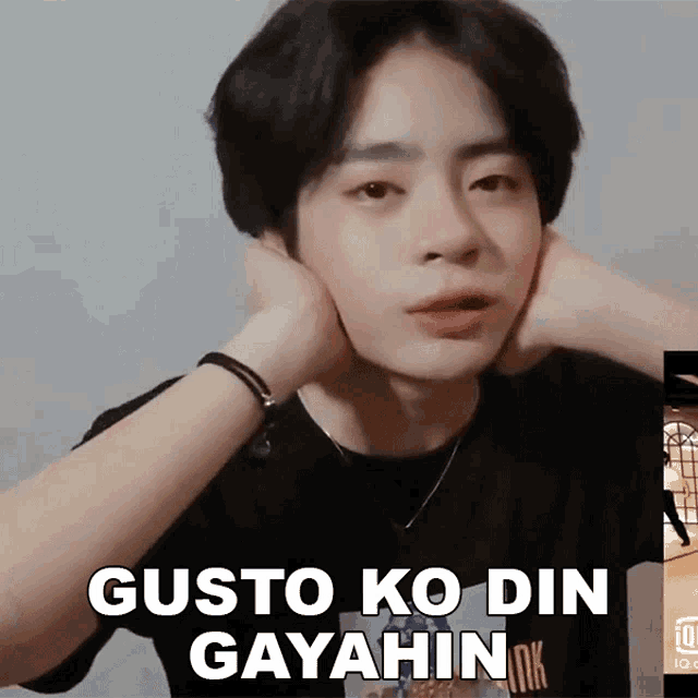 a young man with his hands on his face and the words gusto ko din gayahin on the bottom