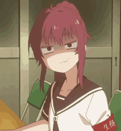a girl with red hair has a red band around her arm with chinese writing on it