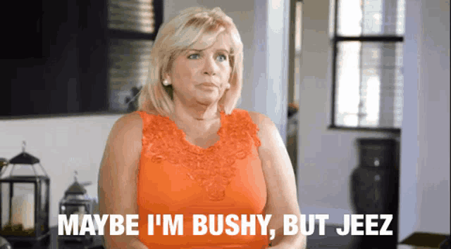 a woman in a red top says maybe i 'm bushy but jeez