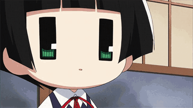 a close up of a cartoon character 's face with a red bow