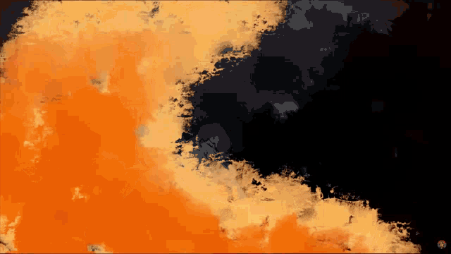 a black and orange background with a few spots