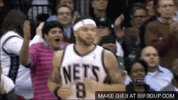 a basketball player wearing a nets jersey with the number 8