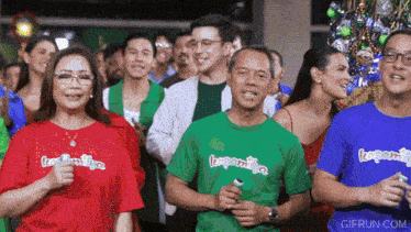 a group of people are wearing t-shirts that say i love my wife