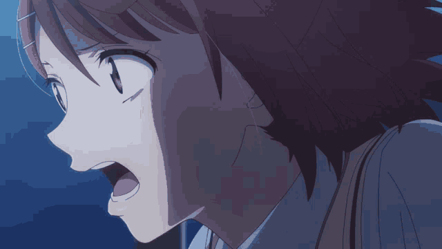 a close up of a girl 's face with red hair