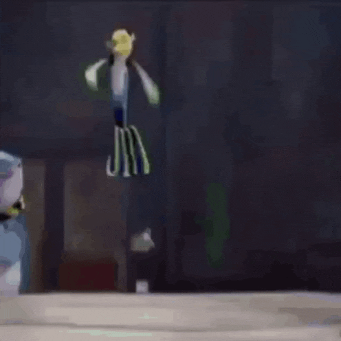 a cartoon character is dancing in front of a table with a spoon and fork on it .