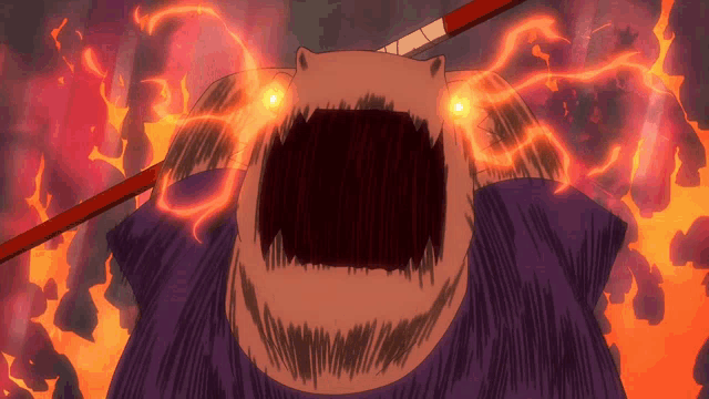 a cartoon drawing of a monster with flames coming out of its eyes