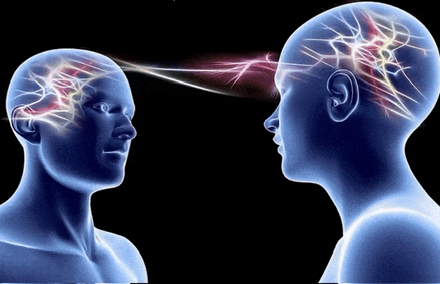a drawing of two people 's heads with light coming out of their brains