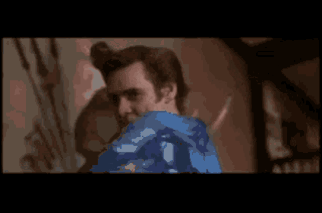 a close up of a man 's face and neck in a movie scene .