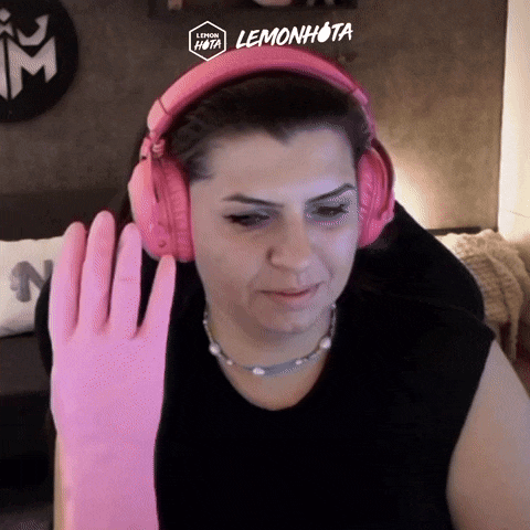 a woman wearing pink headphones and pink gloves with the logo for lemonhota