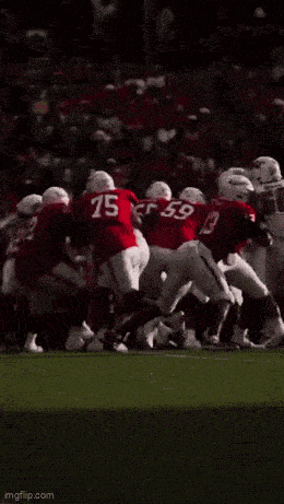 a group of football players including number 15 and number 59
