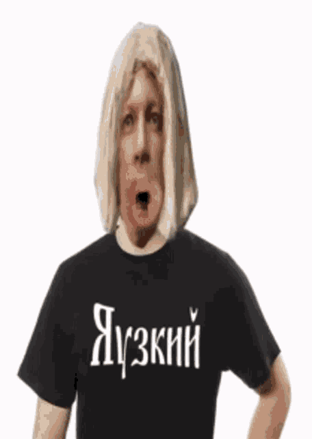 a man with a wig on his head is wearing a black t-shirt that says ' яузкий ' on it