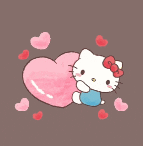 a drawing of hello kitty holding a heart shaped pillow