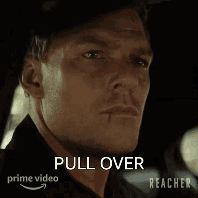 a close up of a man 's face with the words pull over on the bottom right