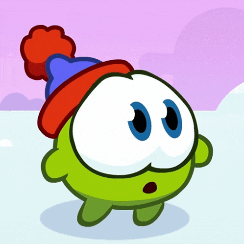 a green cartoon character wearing a red hat