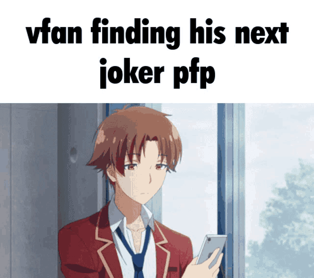 a man in a red suit and tie is looking at his phone with the caption " vfan finding his next joker pp "