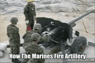 a group of soldiers are standing around a cannon with the caption how the marines fire artillery memecenter.com