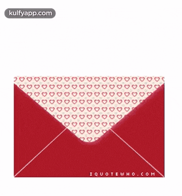 a red envelope with a heart in it and the words `` happy valentine 's day '' written on it .