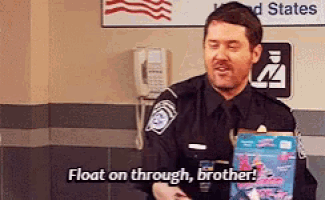 a police officer says float on through brother while holding a bag