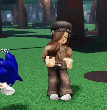 a girl in a hat is standing next to a sonic the hedgehog in a video game