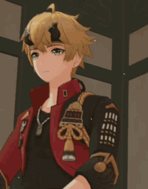 a boy with horns on his head is wearing a red jacket and black shirt