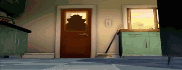 a kitchen with a mop in front of a door and a light switch on the wall